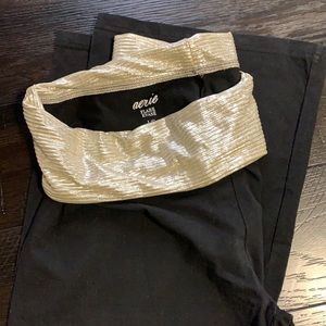 Aerie flare  yoga pants with gold waistband.